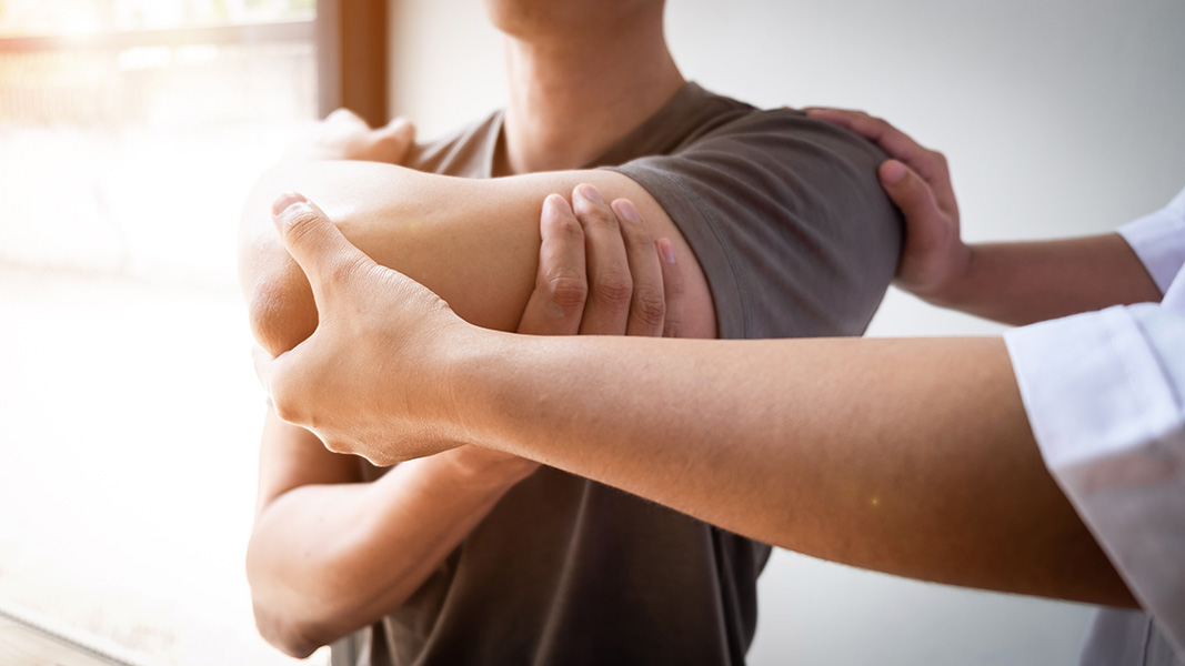 Basic shoulder movement supervised by a Body Pros physical therapist.